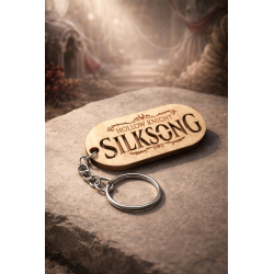 Hollow Knight Silksong wooden keychain in situ