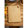 One Piece cutting board with sexy Sanji's back shown, used in the kitchen