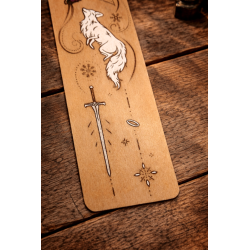Front view of the bottom of the Quicksilver wooden bookmark, zoomed-in details of the engraving and paint
