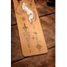 Front view of the bottom of the Quicksilver wooden bookmark, zoomed-in details of the engraving and paint