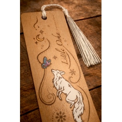Front view of the top of the Quicksilver wooden bookmark, zoomed-in details of the engraving and paint