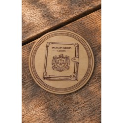 Fourth Wing - Engraved wooden coaster depicting the dragon riders' codex book placed on a wooden table